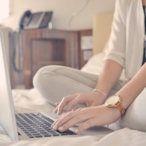 Businesswoman using travel apps